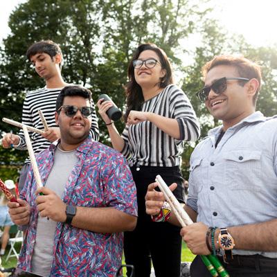 A group of students from Hayat Club gather during a fair 